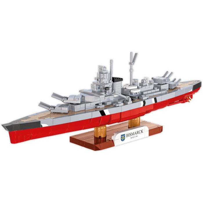 Model of a battleship Bismarck made from building blocks on a white background
