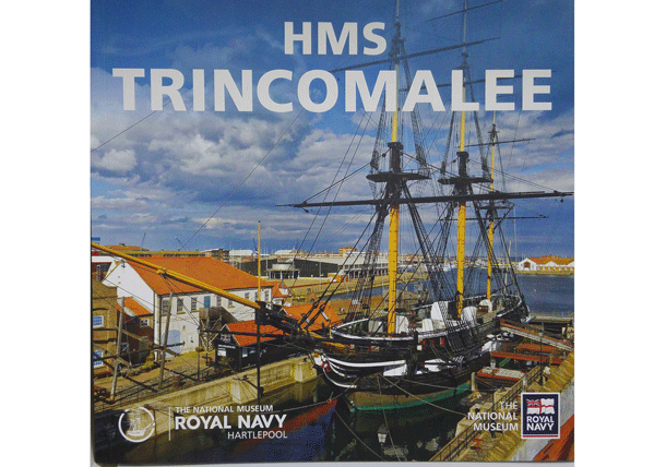 Guidebook for HMS Trincomalee, with a black and white frigate with yellow masts on the cover.