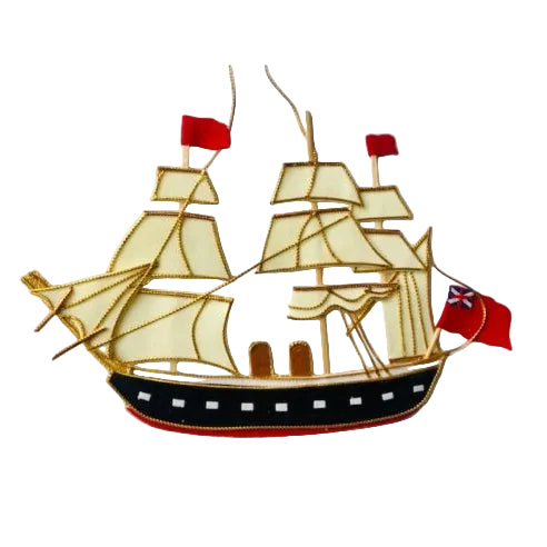Decorative ship ornament with red flags on a white background