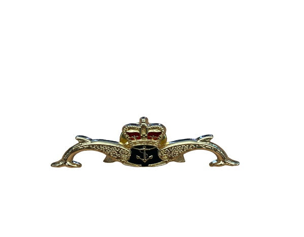 Decorative emblem with a crown and dolphins design