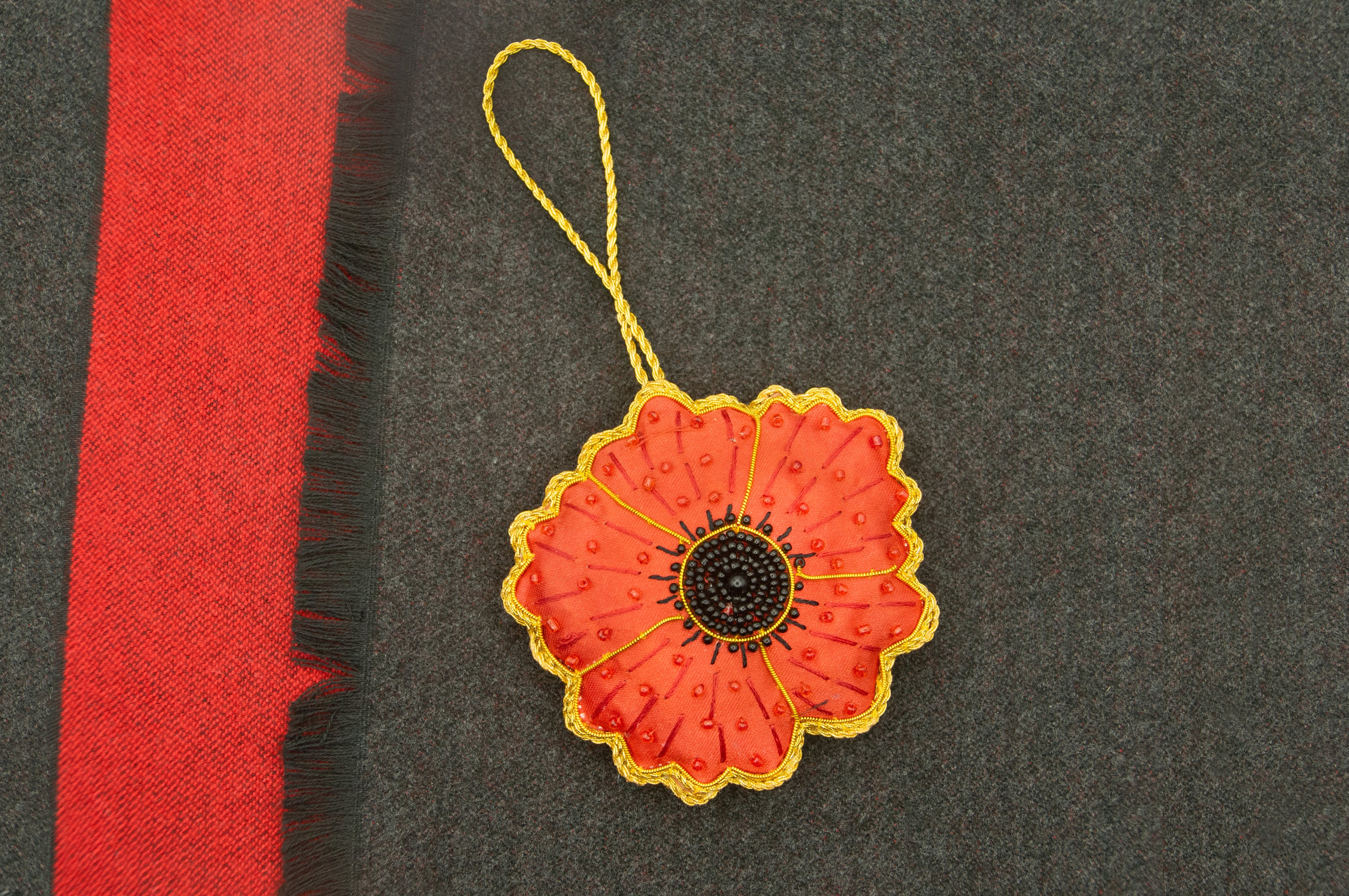 Decorative red flower Christmas tree decoration with gold accents