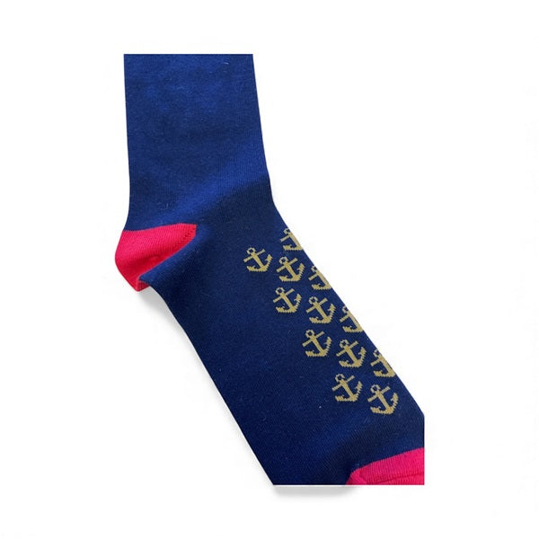 Navy blue sock with gold anchor pattern and red accents on a white background