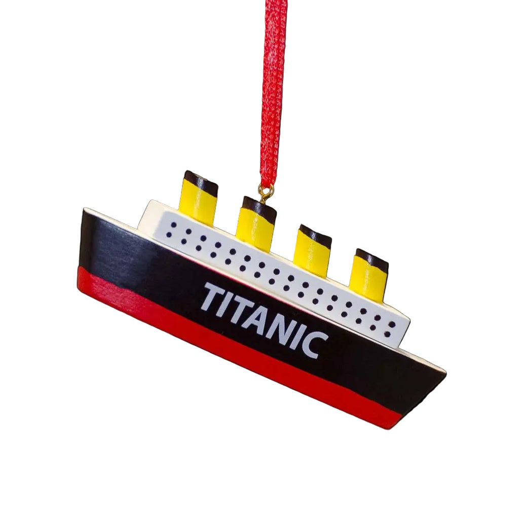 Decorative ornament shaped like the Titanic with a red string on a black background