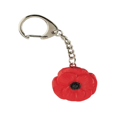 Keychain with red poppy flower charm on a white background