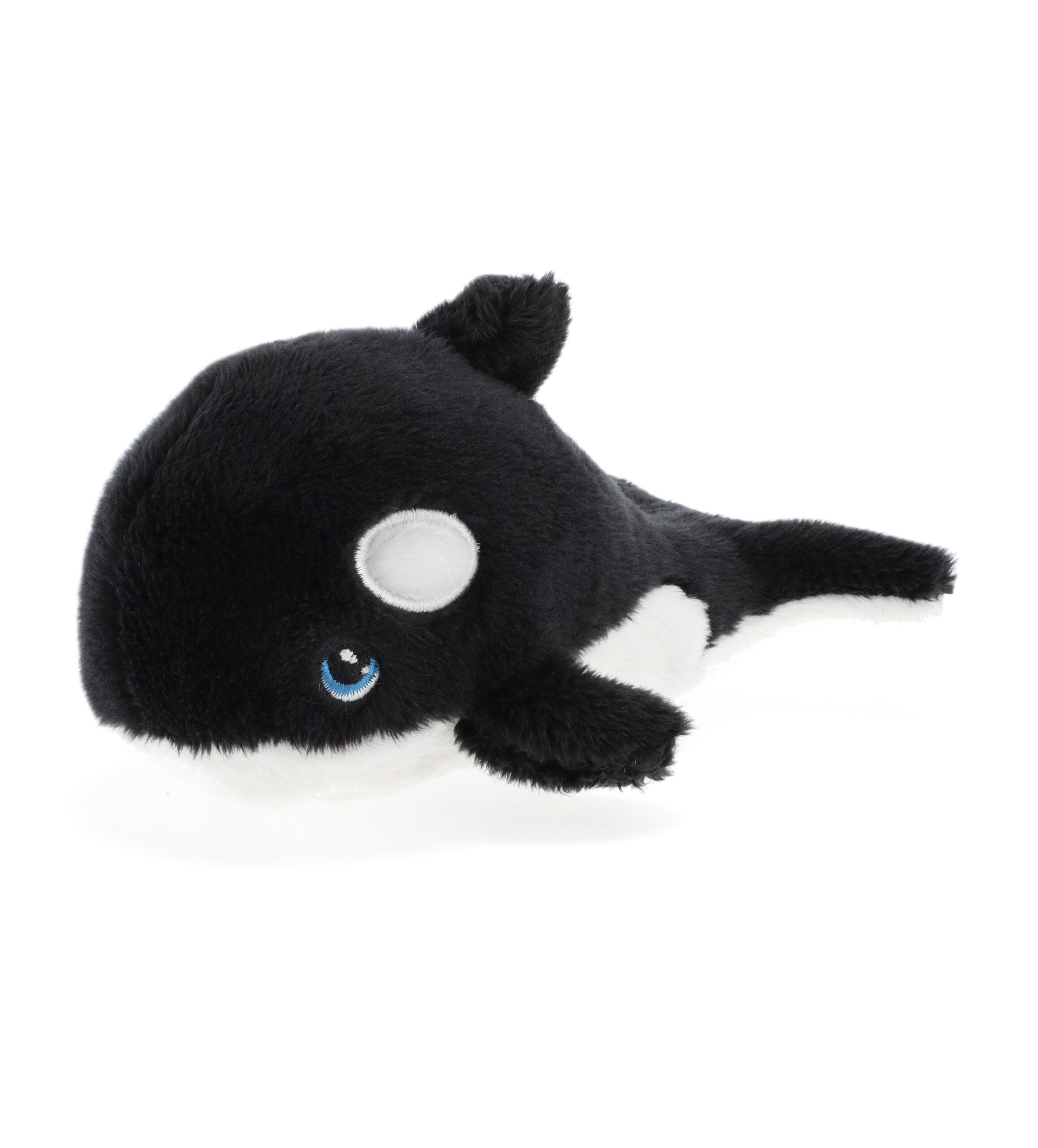 Black and white plush toy whale on a white background